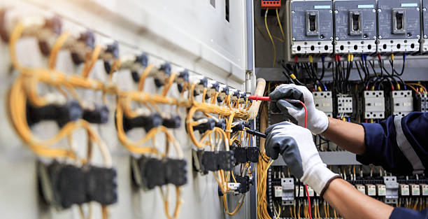 Professional Electrician technician working in Walled Lake, MI